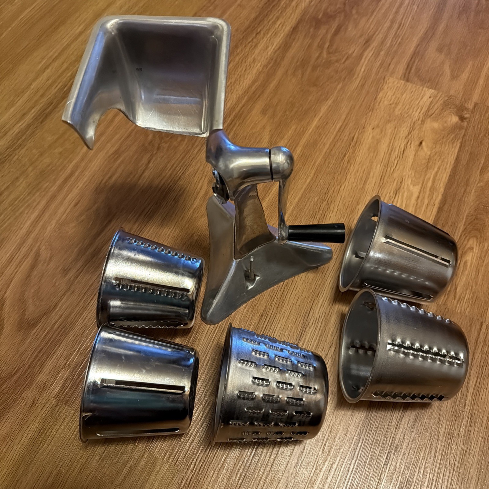 Vintage Kitchen-Quip, Inc. Manual Food Processor with 5 Cones And Suction Base