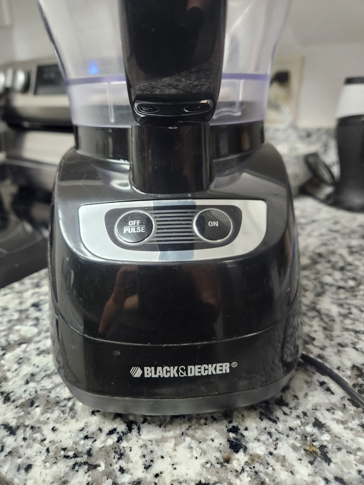 This is a Black+Decker 8- Cup Food Processor (model FP1600B or similar) in black
