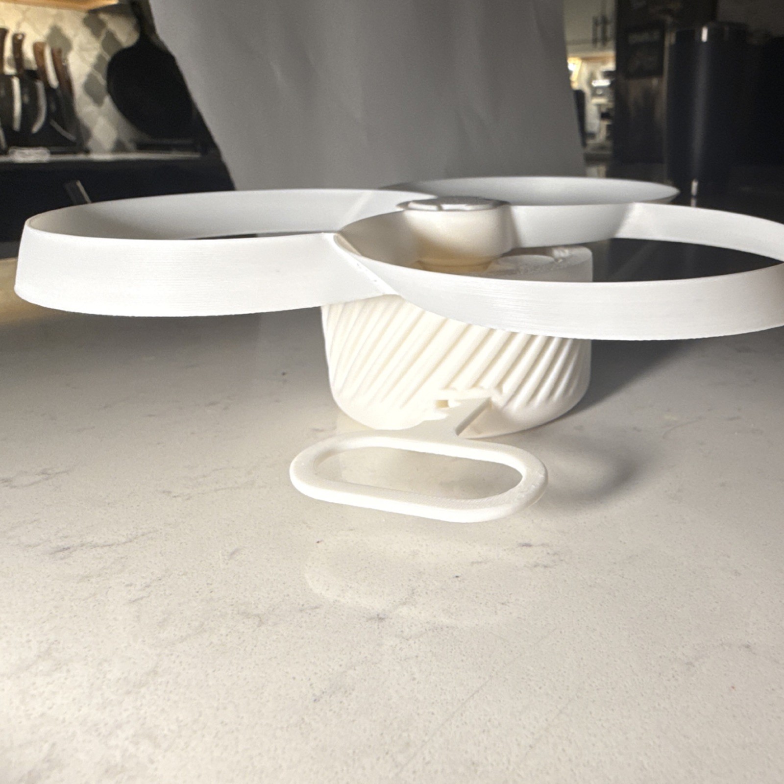 White 3d printed toy with 3 Blades, Plastic Base and Handle all plastic