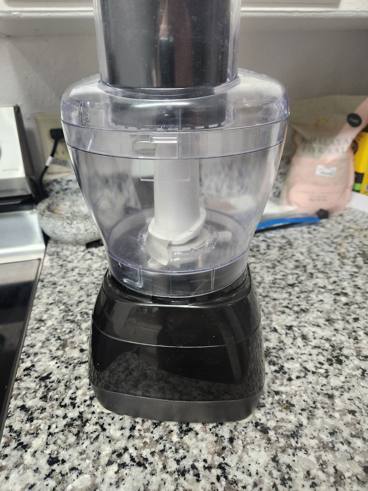 This is a Black+Decker 8- Cup Food Processor (model FP1600B or similar) in black