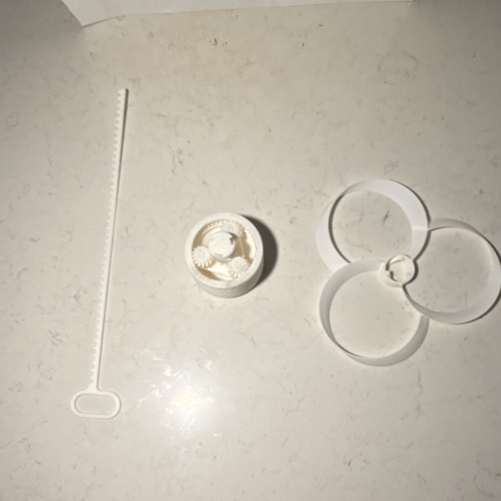 White 3d printed toy with 3 Blades, Plastic Base and Handle all plastic